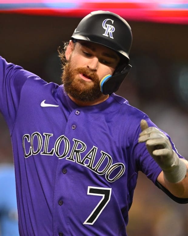 Oct 4, 2022; Los Angeles, California, USA; Colorado Rockies second baseman Brendan Rodgers (7) crosses the plate after a solo home run in the first inning off Los Angeles Dodgers starting pitcher Julio Urias (7) at Dodger Stadium. Mandatory Credit: Jayne Kamin-Oncea-USA TODAY Sports